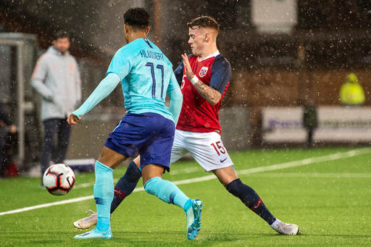 Tobias Heintz of Norway and Justin Kluivert of Netherlands