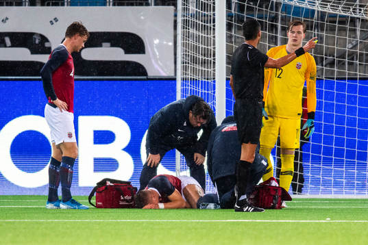 Leo Østigård of Norway is being treated for an injury