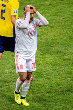 Thiago Alcantara of Spain reacts