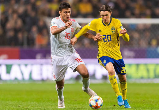 Rodri of Spain and Kristoffer Olsson of Sweden compete for