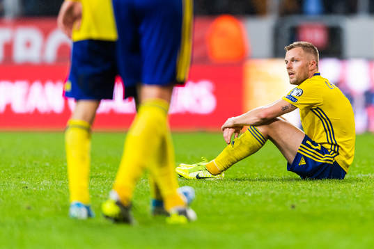 Sebastian Larsson of Sweden looks dejected