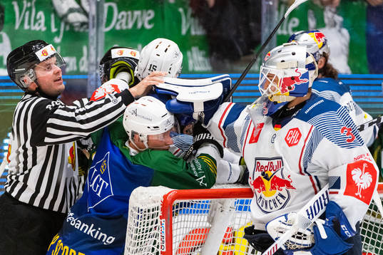 Marcus Nilsson of Färjestad and goalkeeper Kevin Reich of