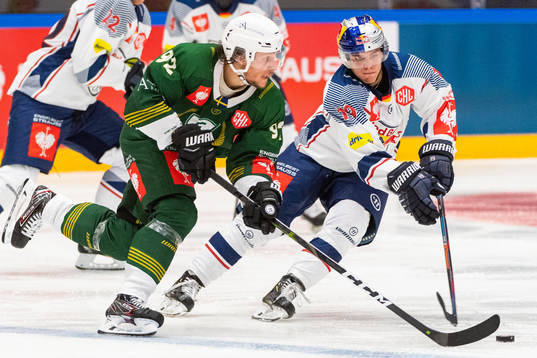 Jesper Olofsson of Färjestad and Dennis Lobach  of Red