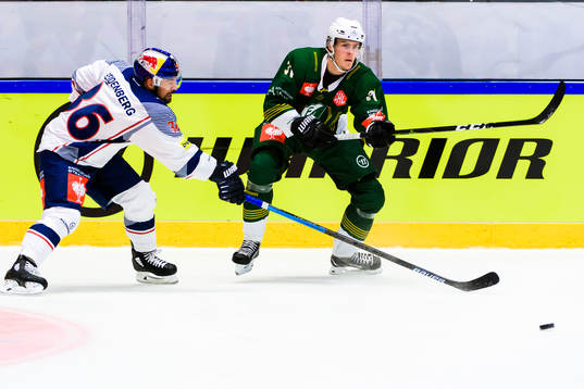 Yannic Seidenberg of Red Bull Munich and Carl Jakobsson of