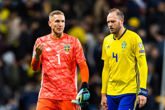 goalkeeper Robin Olsen and Andreas Granqvist of Sweden