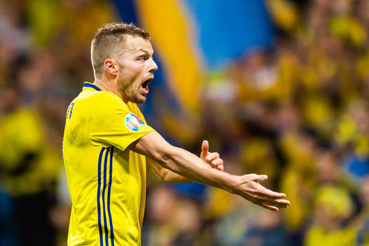 Sebastian Larsson of Sweden calls for hand ball