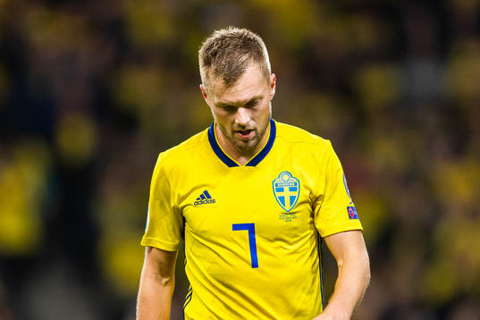 Sebastian Larsson of Sweden looks dejected