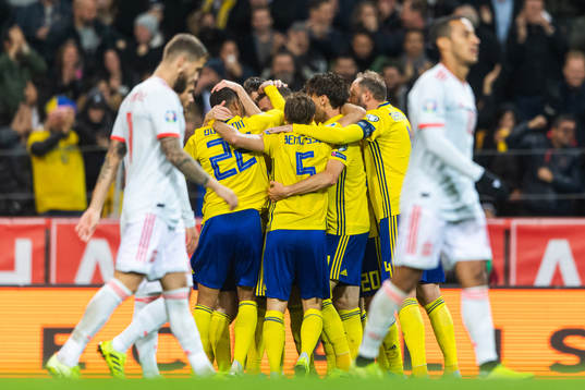 Players of Sweden celebrate