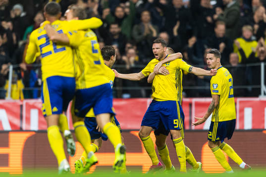 Marcus Berg of Sweden celebrates scoring 1-0