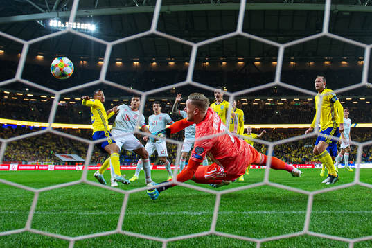 Goalkeeper Robin Olsen of Sweden makes a save