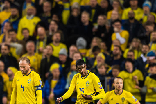 Andreas Granqvist and Alexander Isak look dejected