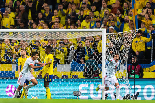 Marcus Berg and Alexander Isak look dejected as Rodrigo of
