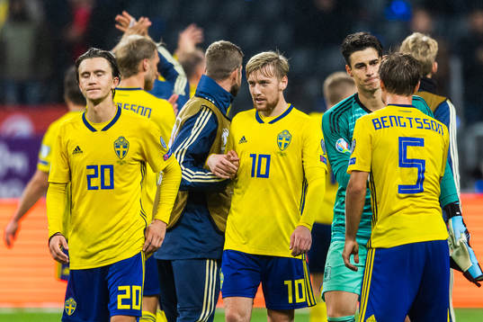 Kristoffer Olsson and Emil Forsberg of Sweden look dejected