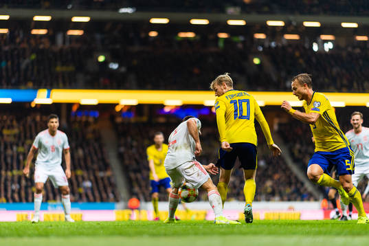 Emil Forsberg and Pierre Bengtsson of Sweden against Dani