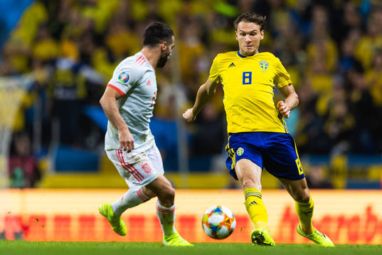 Dani Carvajal of Spain and Albin Ekdal of Sweden