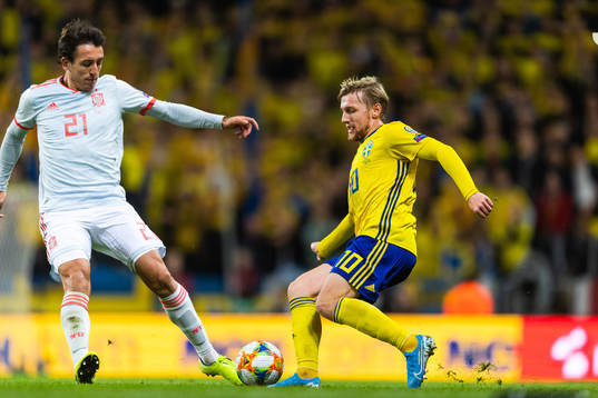 Mikel Oyarzabal of Spain and Emil Forsberg of Sweden