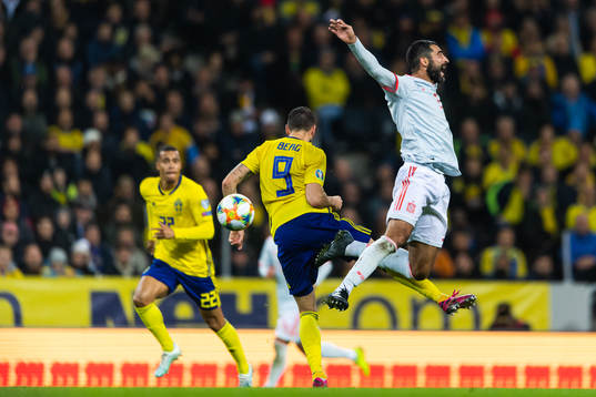Marcus Berg of Sweden and Raul Albiol of Spain