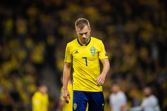 Sebastian Larsson of Sweden looks dejected