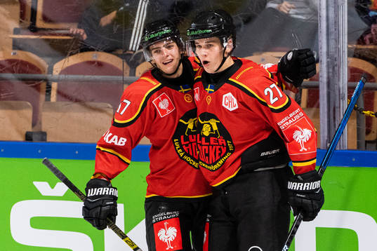 Isac Brännström celebrates with Nils Lundkvist of Luleå