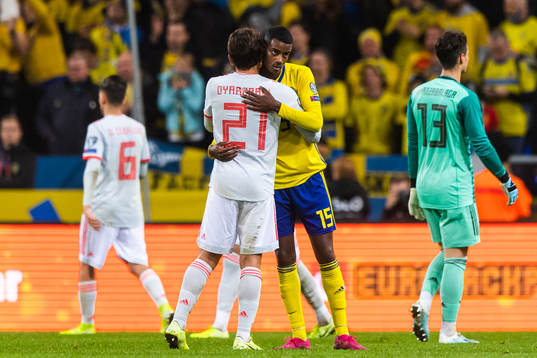 Ken Sema of Spain hug Alexander Isak of Sweden