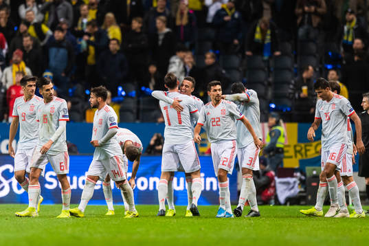 Rodrigo of Spain celebrates with team mates