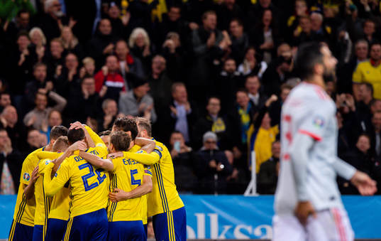Players of Sweden celebrate the 1-0 goal by Marcus Berg