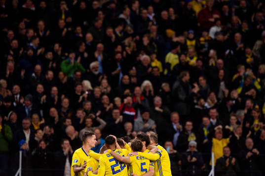 Players of Sweden celebrate the 1-0 goal by Marcus Berg