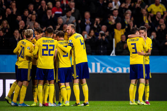 Players of Sweden celebrate the 1-0 goal by Marcus Berg