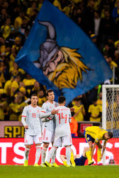 Rodrigo, Mikel Oyarzabal and Juan Bernat of Spain celebrate