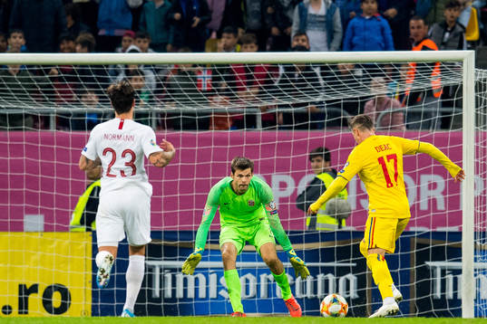 Goalkeeper Rune Almenning Jarstein and Ciprian Deac of