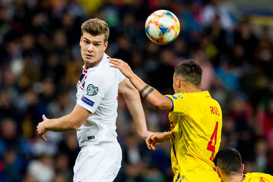 Alexander Sørloth of Norway and Adrian Rus of Romania