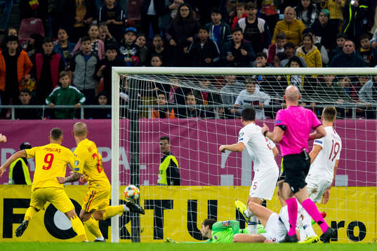 Alexandru Ionut Mitrita of Romania scores 1-0 behind