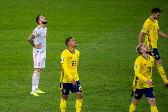 Inigo Martinez of Spain looks dejected