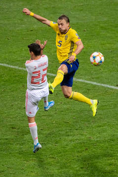 Pierre Bengtsson  of Sweden and Jesus Navas of Spain