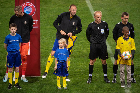 Goalkeeper Robin Olsen, Andreas Granqvist of Sweden and