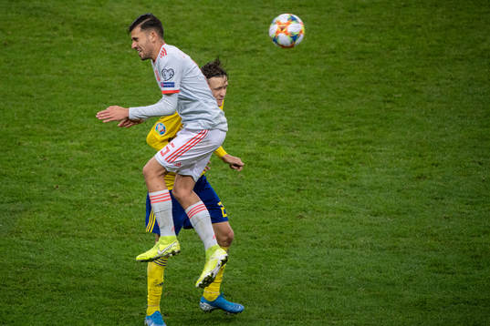 Dani Ceballos of Spain and Kristoffer Olsson of Sweden