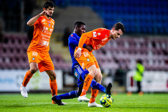 Sundsvalls Peter Wilson och AFC Eskilstunas Jesper Björkman