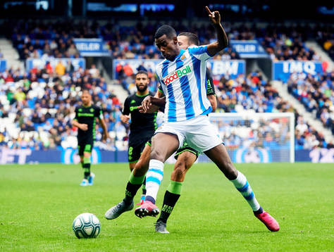 Alexander Isak of Real Sociedad battles for the ball with