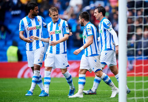 Cristian Portugues of Real Sociedad celebrates with his
