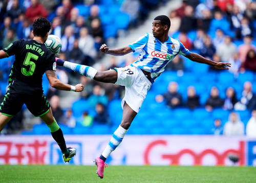 Alexander Isak of Real Sociedad battles for the ball with