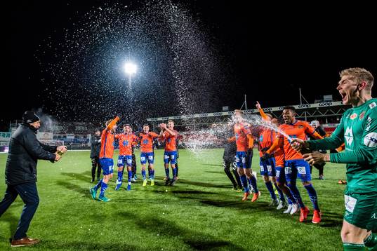 Players of Aalesund celebrates promotion to the Eliteserien