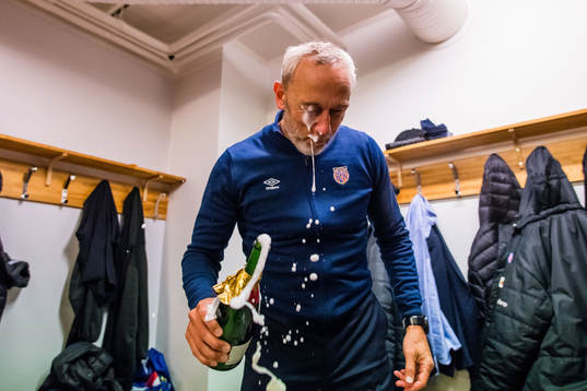 Lars Bohinen, head coach of Aalesund, celebrates promotion