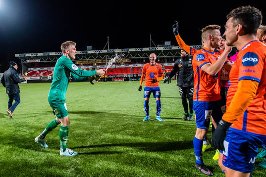 Andreas Lie of Aalesund celebrates promotion to the