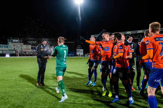 Lars Bohinen, head coach of Aalesund, celebrates promotion