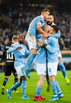 Jo Inge Berget of Malmö FF celebrate with teammates