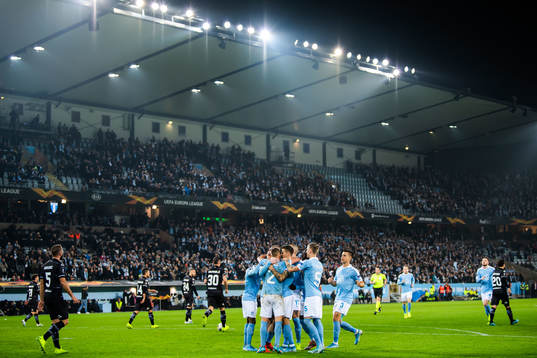 Jo Inge Berget of Malmö FF celebrate with teammates