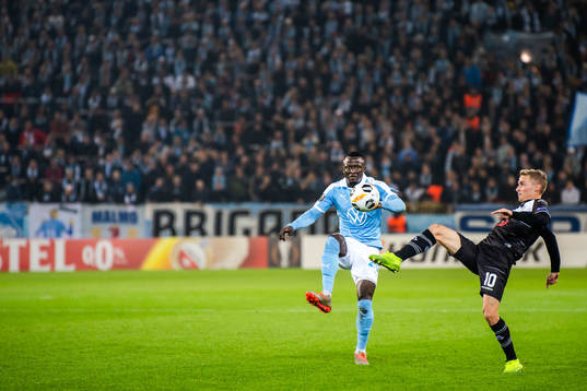 Bonke Innocent of Malmö FF and Mattia Bottani of Lugano