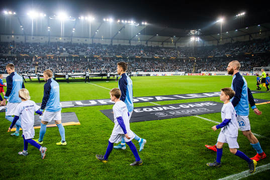 Players of Malmö FF enter the pitch