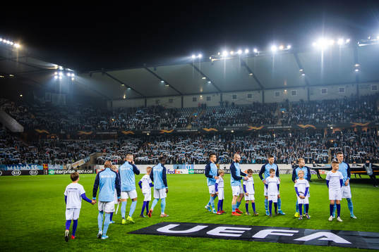 Players of Malmö FF enter the pitch