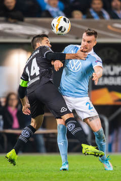 Jonathan Sabbatini of Lugano and Eric Larsson of Malmö FF